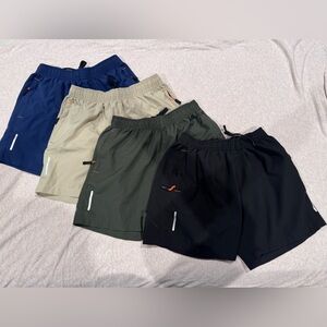 Kids Multi-Color 4 pair Shorts Set. Boys size 12. 97% Polyester. Zip pockets.
